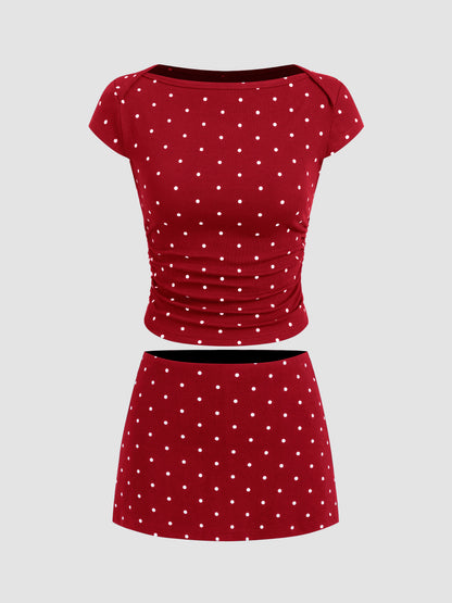 Mia - Camiseta acanalada de lunares con cuello barco y minifalda con short interior