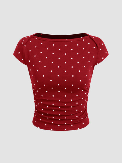 Mia - Camiseta acanalada de lunares con cuello barco y minifalda con short interior