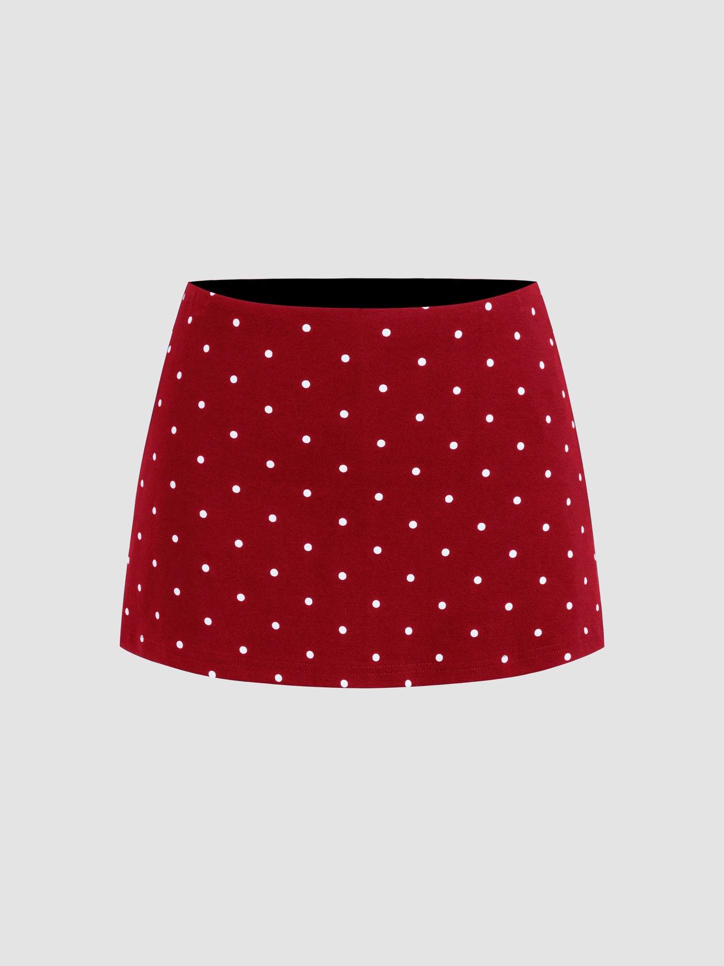 Mia - Camiseta acanalada de lunares con cuello barco y minifalda con short interior