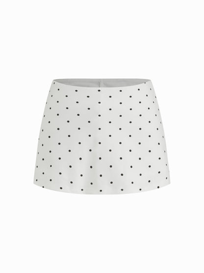 Mia - Camiseta acanalada de lunares con cuello barco y minifalda con short interior