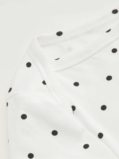 Mia - Camiseta acanalada de lunares con cuello barco y minifalda con short interior