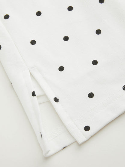 Mia - Camiseta acanalada de lunares con cuello barco y minifalda con short interior