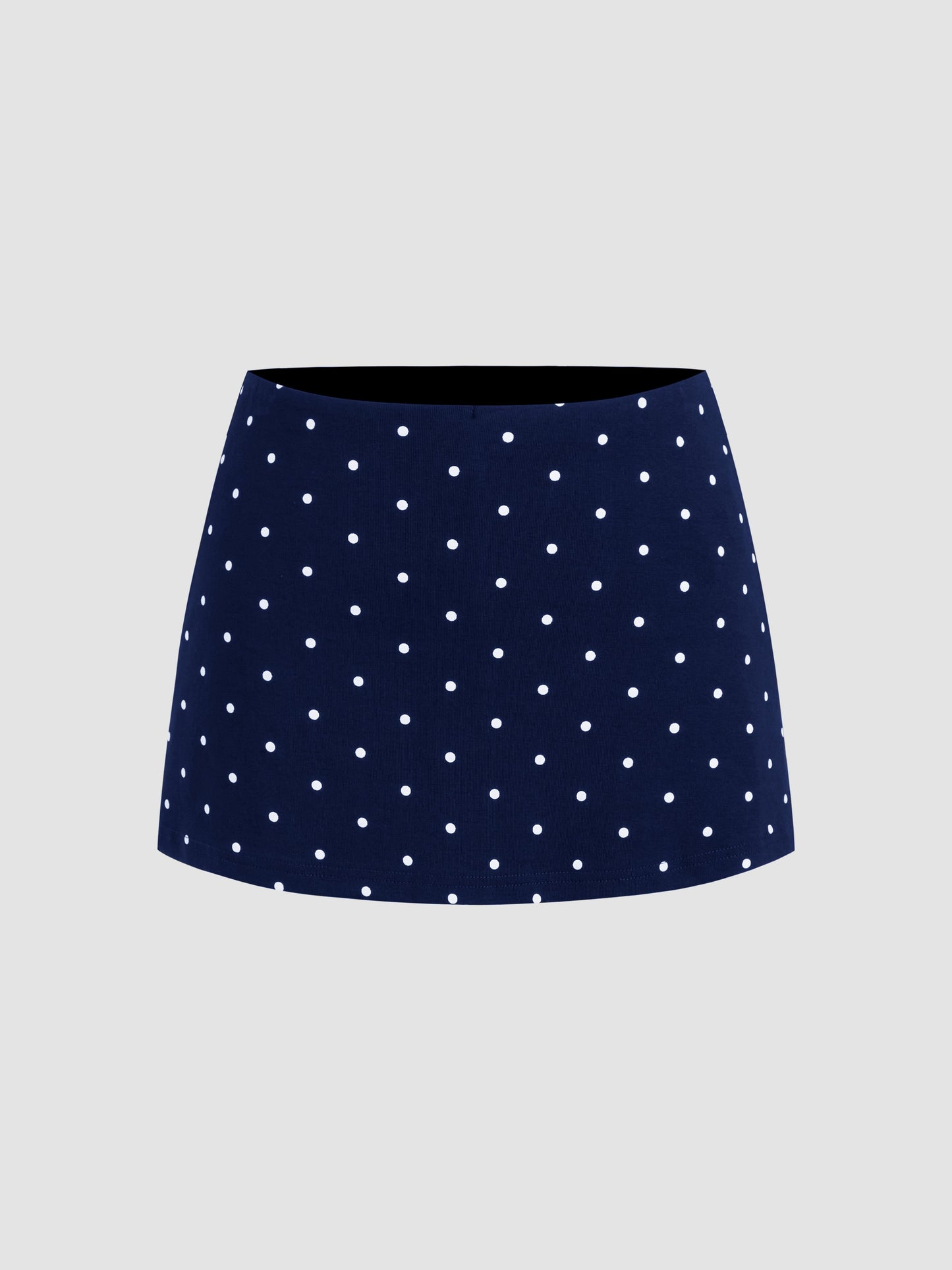 Mia - Camiseta acanalada de lunares con cuello barco y minifalda con short interior