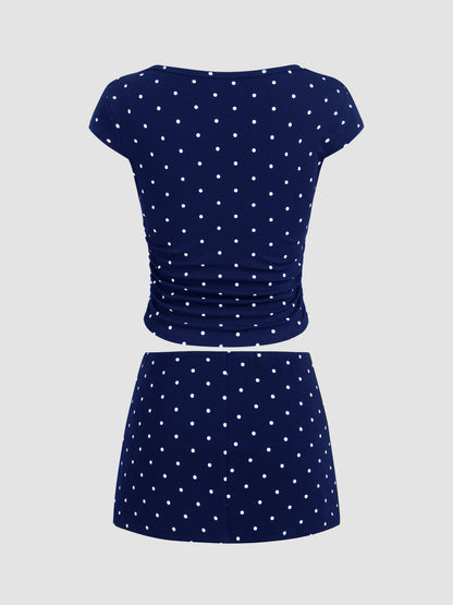 Mia - Camiseta acanalada de lunares con cuello barco y minifalda con short interior