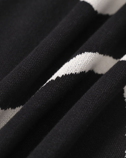 Luna - Vestido midi de punto negro con bajo sirena y ondas