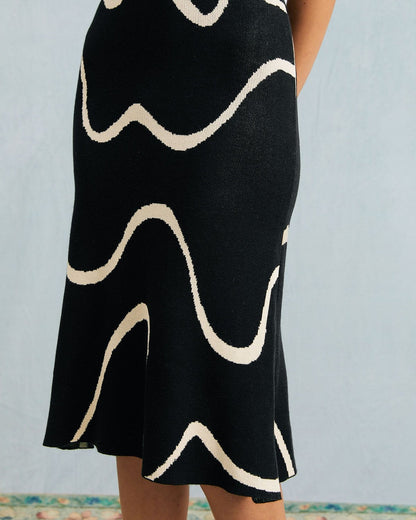 Luna - Vestido midi de punto negro con bajo sirena y ondas